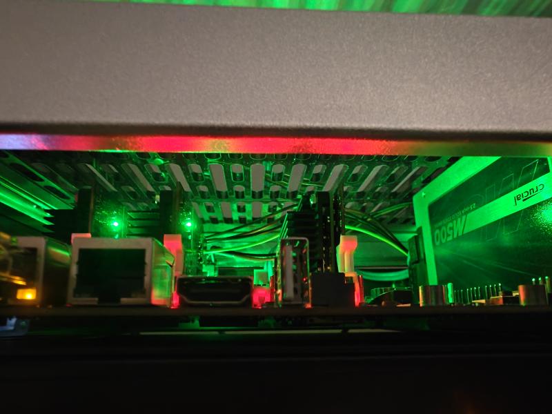 A view of the Turing Pi looking up into the top of the rack showing the tight fit