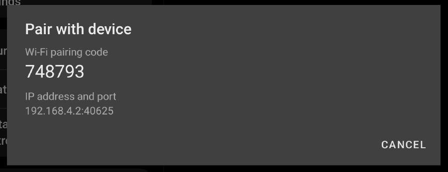The pairing dialog showing information used to connect via adb